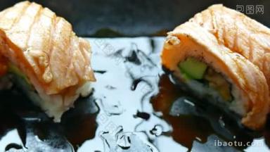 用竹筷子、传统日本料理吃美味的寿司卷 